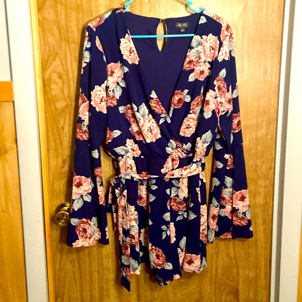 Only worn once, new blue and floral romper